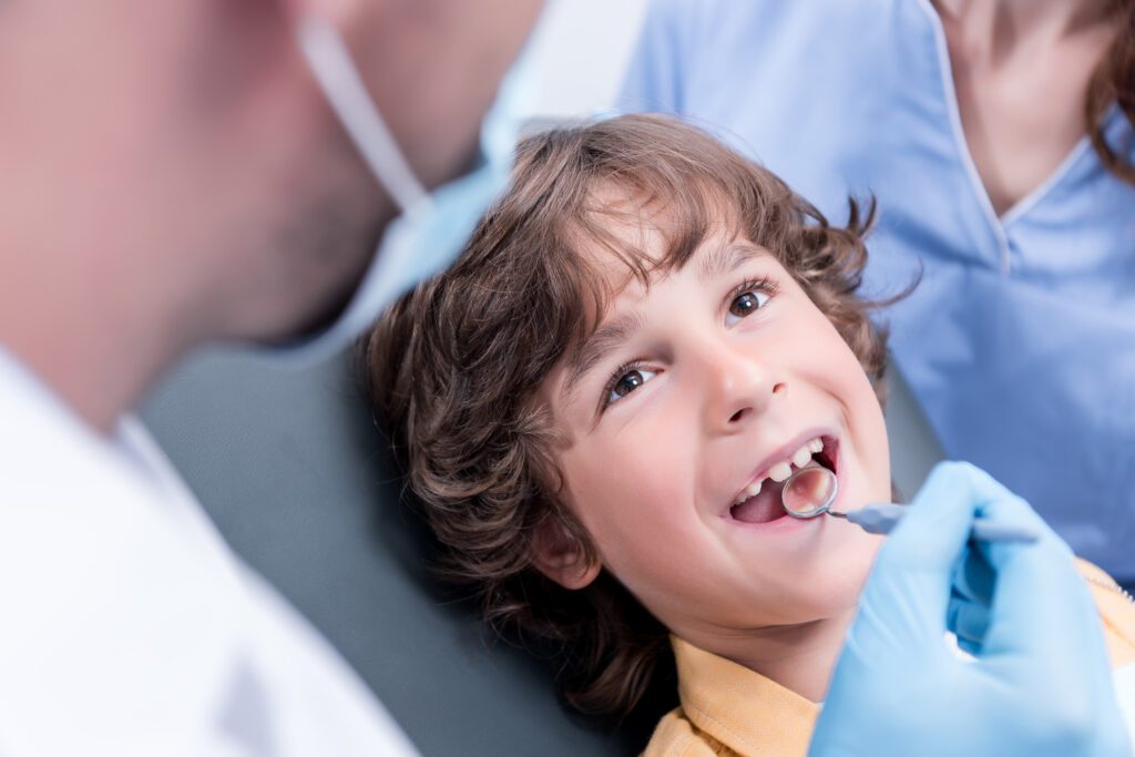 dental work for children
Dentist examining child's teeth